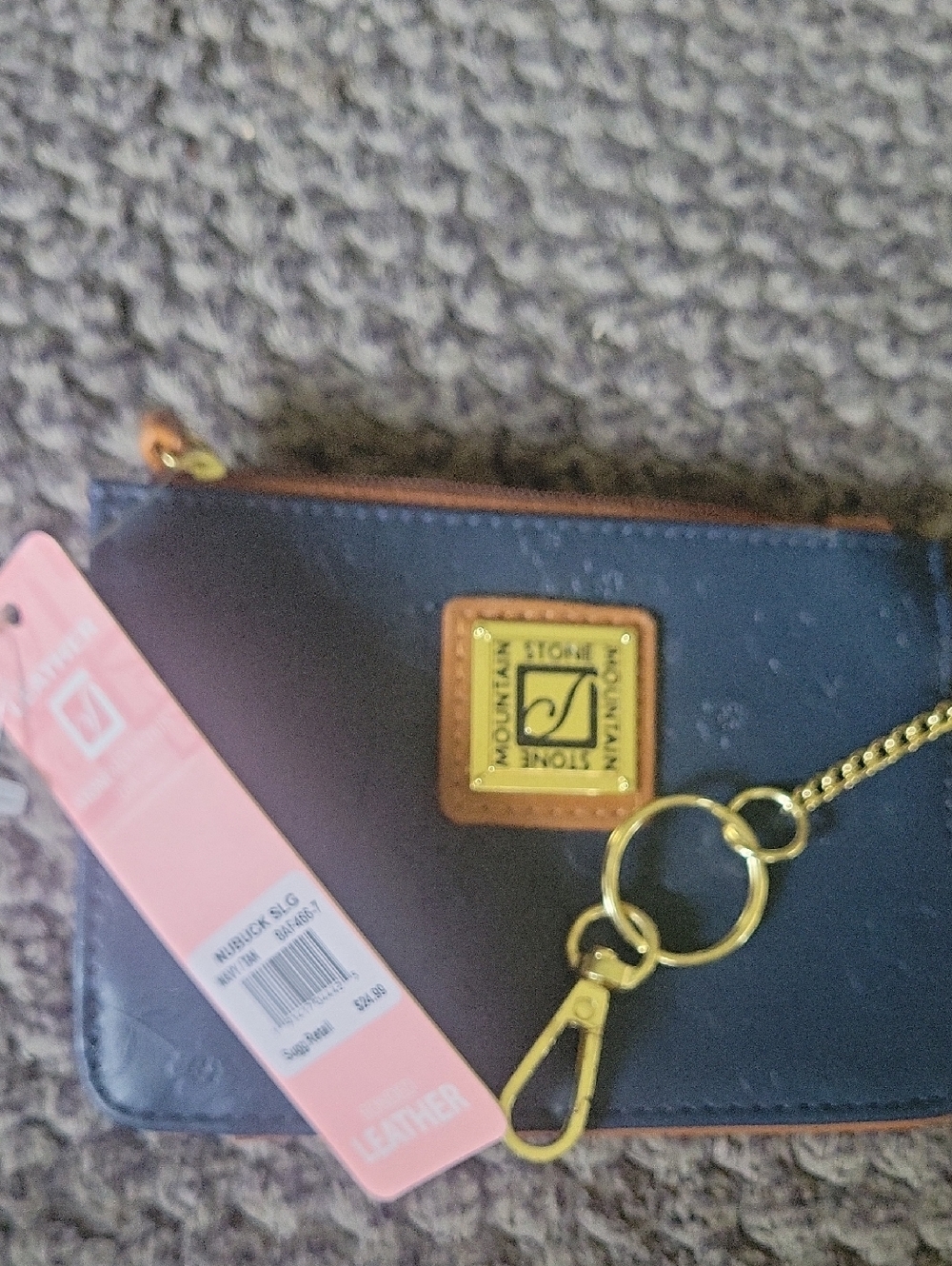 Stone Mountain Navy Embossed Leather Wristlet with Tan Trim and Gold Logo